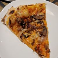 Sausage Onion Mushroom Pizza at The Oasis Santa Rosa Beach in Santa Rosa Beach
