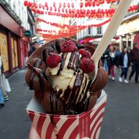 Choco base, pistachio ice cream, raspberries and chocolate sauce at Bubblewrap Waffle in London