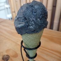 Wakanda ice cream on matcha cone at eighty7sweets Vegan Ice Cream Company in Atlanta