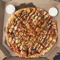 Loaded tot vegan pizza with sides of vegan ranch!!! Amazing!!!  at Toppers Pizza in De Pere