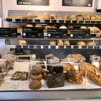 4 vegan treats and in the back fresh organic bread at Bio Kleiweg in Rotterdam