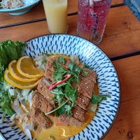 Passion fruit lemonade and vegan curry with tofu at Nyom in Berlin
