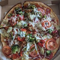 Vegan sausage and gluten free crust at Mod Pizza in Dallas