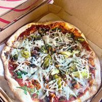Custom pizza with vegan cheese and vegan sausage   at Mod Pizza in Dallas
