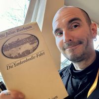 books to read at the table  at Aha Cafe in Dresden