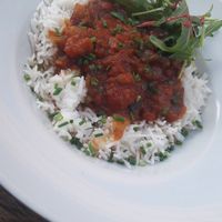 spicy aubergine pot with rice (vegan) at Aha Cafe in Dresden