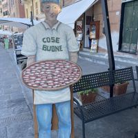 Some company outside near the seats with sea views at Cose Buone in Camogli