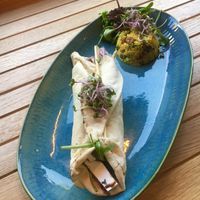 Heerlijke Arabische wrap met vegan feta, ras el hanout, couscous, rode ui, koriander, munt en rauwkost 😊😊   at Bibliotheek Oosterschelde in Goes