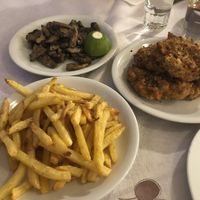 Chips, garlic mushrooms and chickpea fritters  at Taverna Tsambikos in Rhodes