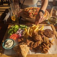 Vegan pizza and Mixed Vegan Plate at Orexi in Rhodes