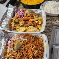 Vegan pad thai (front), yellow curry (back) at Phuket I'm Vegan in Murrieta