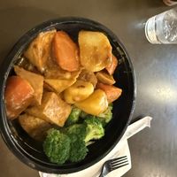 Curry tofu and rice (potatos and carrots)  at Foodie & Sweetie DMarket in Salt Lake City