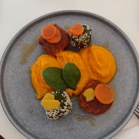 Arancini with carrot puree and ginger glaze at BUNT Bistro in Cluj-napoca