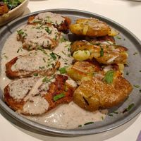 Soy schnitzel and potatoes with pepper sauce at BUNT Bistro in Cluj-napoca