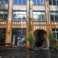 Restaurant from outside, entrance in tunnel at Buya Izakaya Ramen in Berlin
