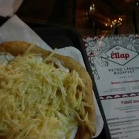 Vegan langos with sour cream and cheese at Retró Lángos Budapest in Budapest