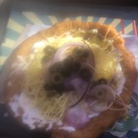 Langos with optional olives and red onions  at Retró Lángos Budapest in Budapest
