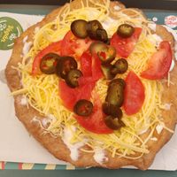 I took the classic vegan lángos and asked to add jalapeños and tomato (I recommend!!) at Retró Lángos Budapest in Budapest