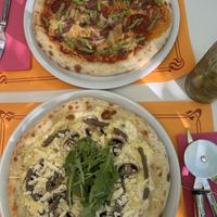 Vegan pizzas (truffle and mushrooms and Vmeaty)  at Freedom Pizza in Madrid