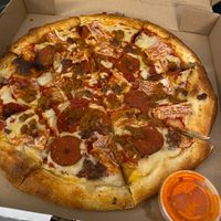 Large meat lover’s pizza at Meek's Vegan Pizza in Houston