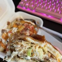 Soy chicken burger and righteous fries - ordered on UberEats  at Righteous Burger in Tokyo