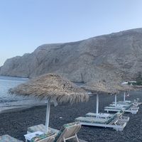 beach chairs belonging to restaurant at Poseidon in Santorini
