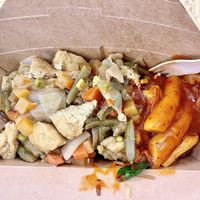 Vegan tofu curry on top of jap chae plus vegan rice sticks at Kim's Korean Food Fusion in East London