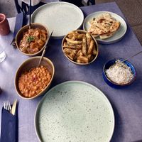 Pomegranate Chole, masala chips & veggie rice (vegan GF). Butter paneer & naan (vegetarian only)  at Tawa Kitchen in Cambridge