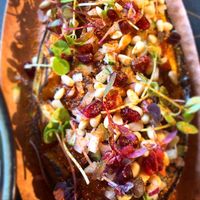 Jasper smoked aubergine with pomegranate  at Khai Khai in Newcastle Upon Tyne