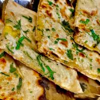 Kulcha Naan (potato and spices filling) €4.50  at Clay Oven in Albufeira