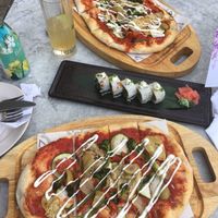 Charred broccolini and zucchini pizzette and charred asparagus sushi rolls  at Victors in Oxford