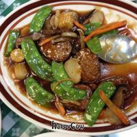 vegan fish in brown sauce  at Veggie Cafe in Richardson