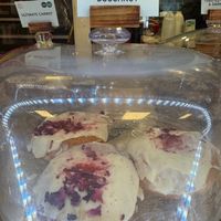 Raspberries white chocolate doughnut at 3 Peaks Cycles in Settle