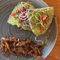 Avocado toast w/ mushroom   at Okapi in Neuchatel