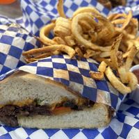 Cheesesteak and curly fries   at Cozo Grill in Portland
