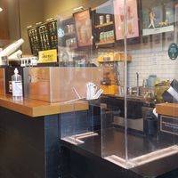 taking my order... at Starbucks in Bucharest