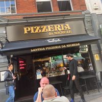 Exterior of restaurant and also has a beautiful interior on two levels at L'Antica Pizzeria da Michele in London