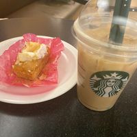 Oat milk iced caramel latte and new lime and coconut sponge cake hundred percent vegan at Starbucks - Wardour in London
