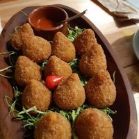 Coixinhas de jaca (jackfruit) 🧡 at São Saruê in Sao Paulo