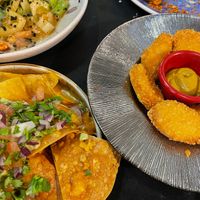 Nachos and vegan nuggets with a curry/mustard sauce  at Bar Tomeu in Sitges
