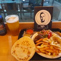 Falafel plate and alcohol free beer at Laffa Israel Street Food in Chisinau