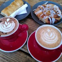 Chai latte, hot chocolate, cinnamon swirl and sausage roll at FRÂN Las in Llanberis