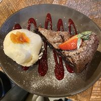 chocolate hazelnut brownie with vegan vanilla ice cream   at Coal & Cotton in Worsley