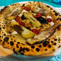 Pizza parmigiana vegan at Pizzeria Marghe 1889 in Lloret De Mar