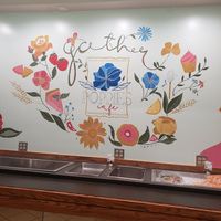 Beautiful hand painted mural inside at Poppies Cafe in Wichita