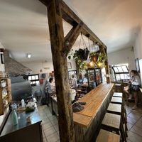 Sit at the bar   at Pom Pom Bagels in Lagos