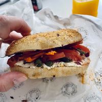 carrot lox, vegan cream cheese (made from tofu, delicious) capers, red onion, tomato and dill  at Pom Pom Bagels in Lagos