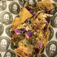 Nachos!!!! Also good with their money mustard 😛  at Community Vegan in Austin
