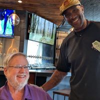Congratulating the chef/owner at COMMUNITY Kitchen + Taproom in Austin