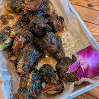 glazed charred brussels sprouts at COMMUNITY Kitchen + Taproom in Austin